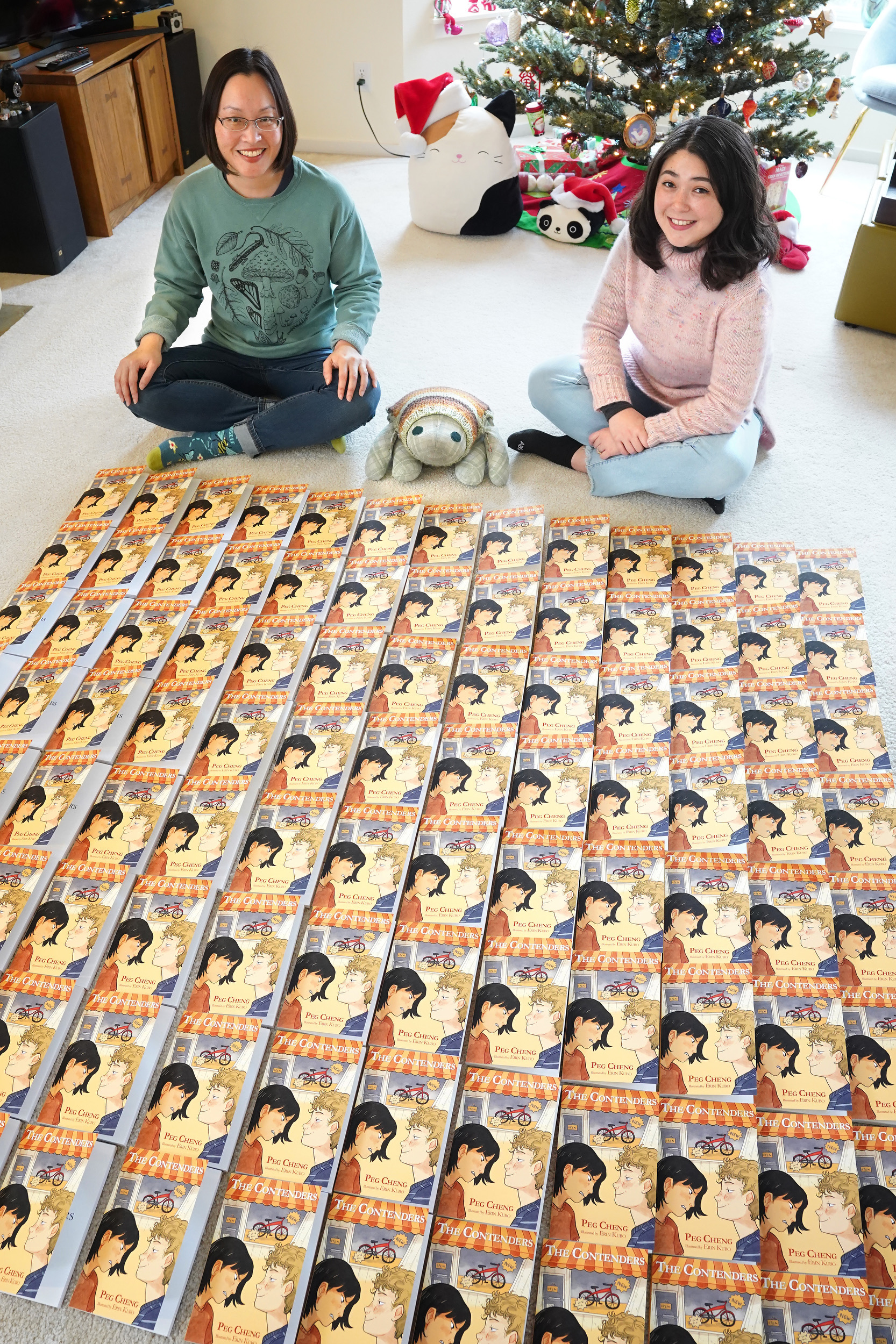 Author Peg Cheng & illustrator Erin Kubo sign the first 100 copies of The Contenders.